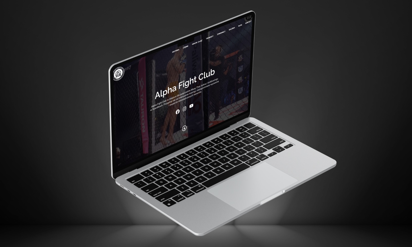 Strona Alpha Fight Club na ekranie laptopa